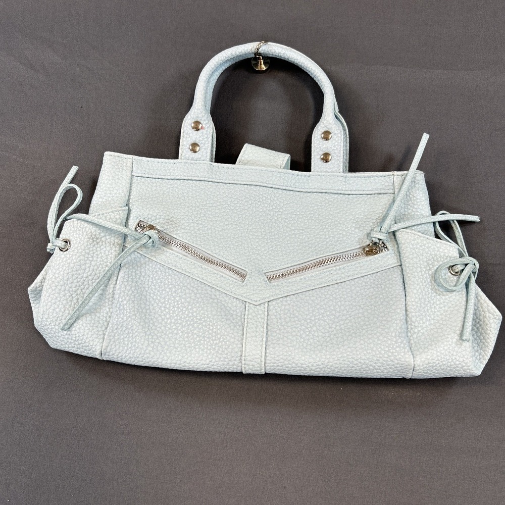 Blue Texturedine handbag features a textured pebbled leather exterior 13 X 7